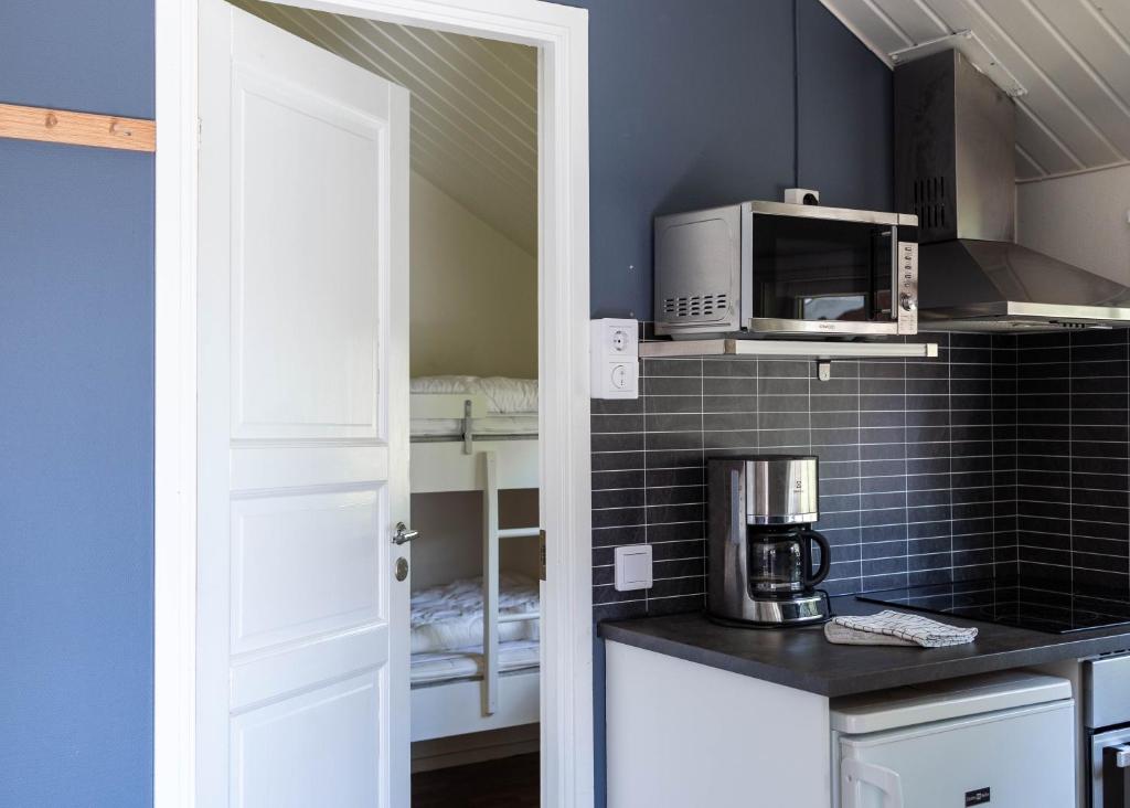 Kuchyň nebo kuchyňský kout v ubytování Västervik Resort