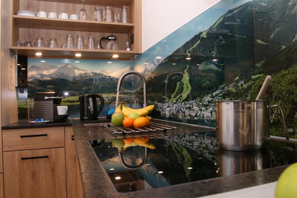 Kuchyň nebo kuchyňský kout v ubytování Alm Appartements ZellamSee