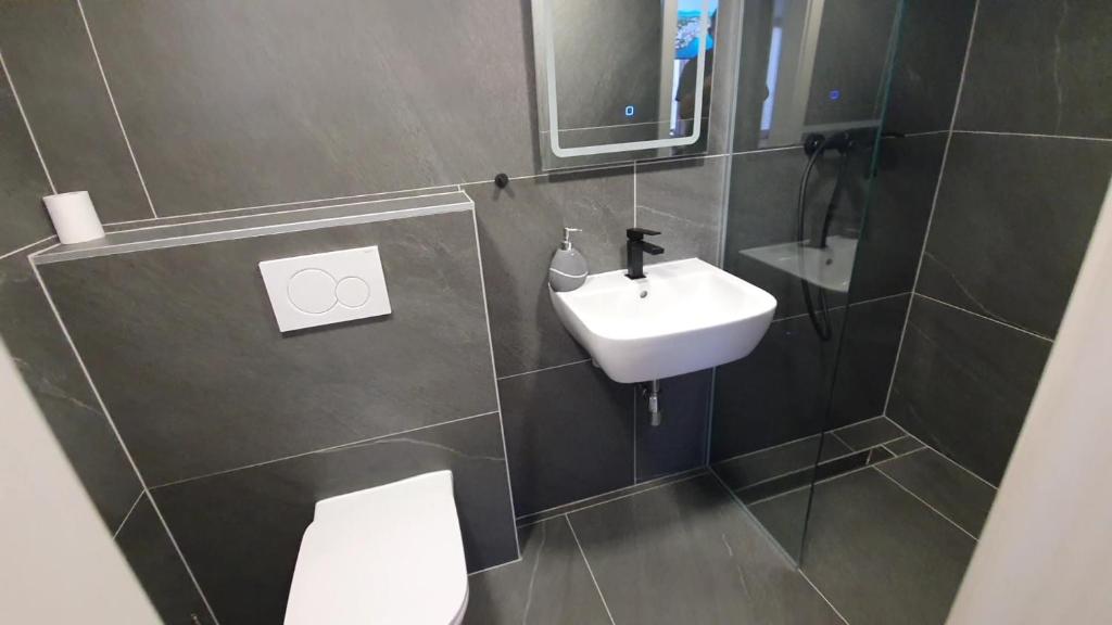 Koupelna v ubytování Apartments Akacijev Izvir