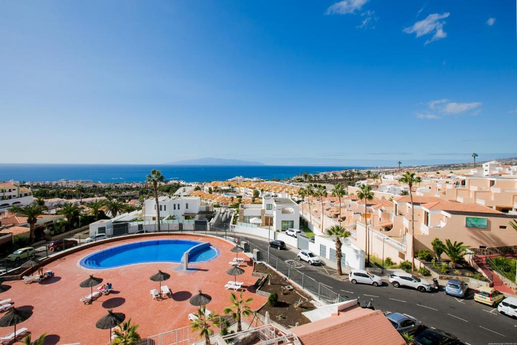 Bazén v ubytování 404 Colina Blanca Vista al Mar y WIFI nebo v jeho okolí