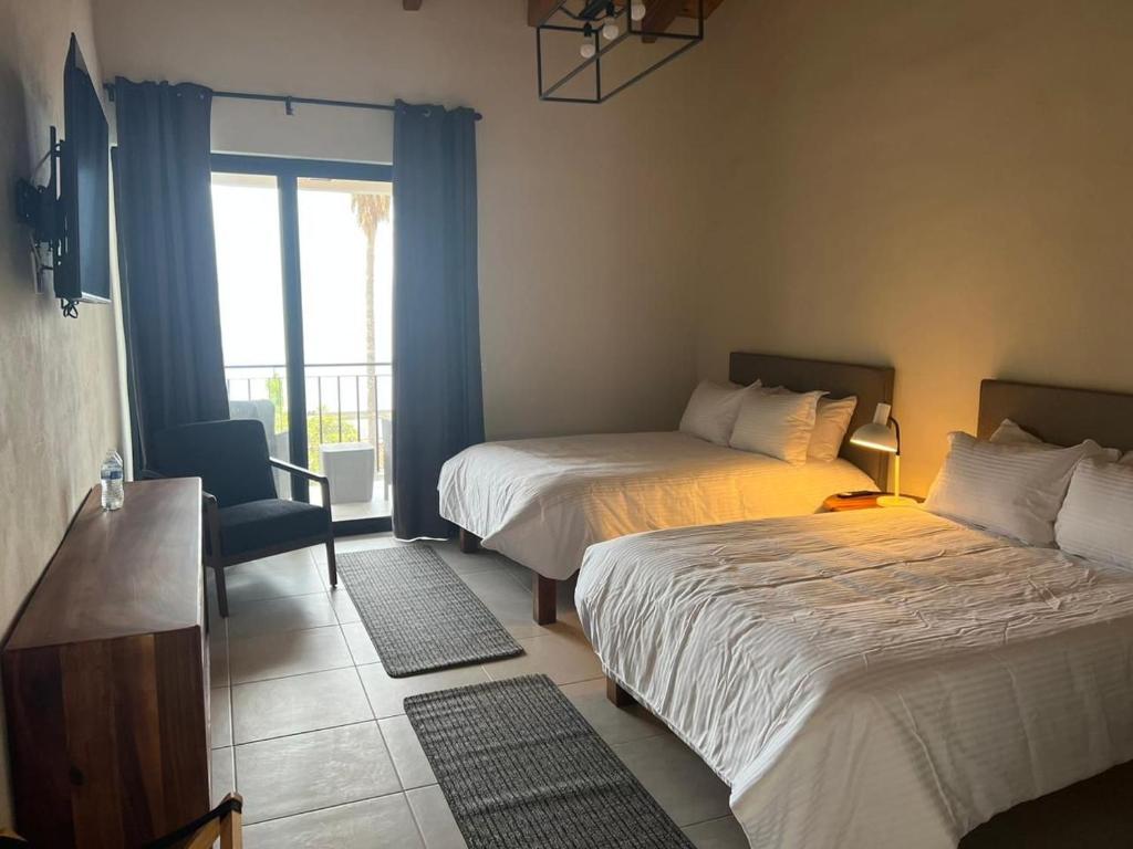 Postel nebo postele na pokoji v ubytování CASA RIVERA DE MORAS