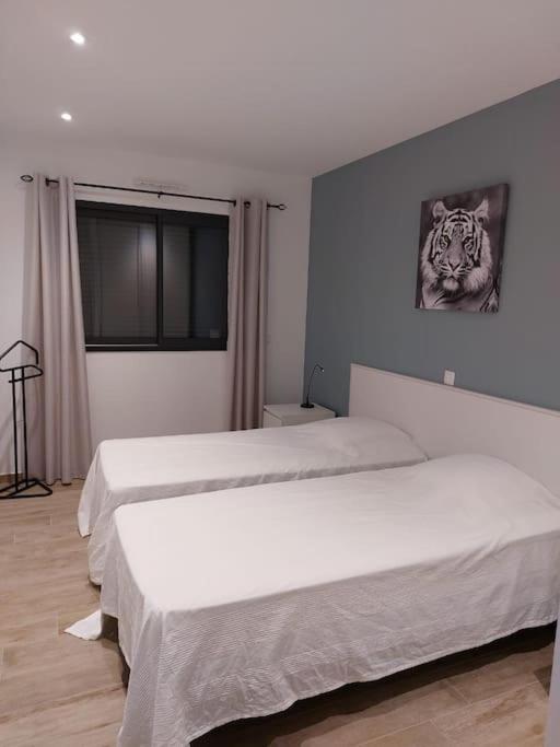 Un ou plusieurs lits dans un hébergement de l'établissement Cap Sud,apt 4p,vue mer,pr plage