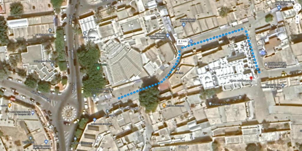 a map of a city with a blue line at Hôtel Djerba Authentique - Au centre de Midoun in Midoun