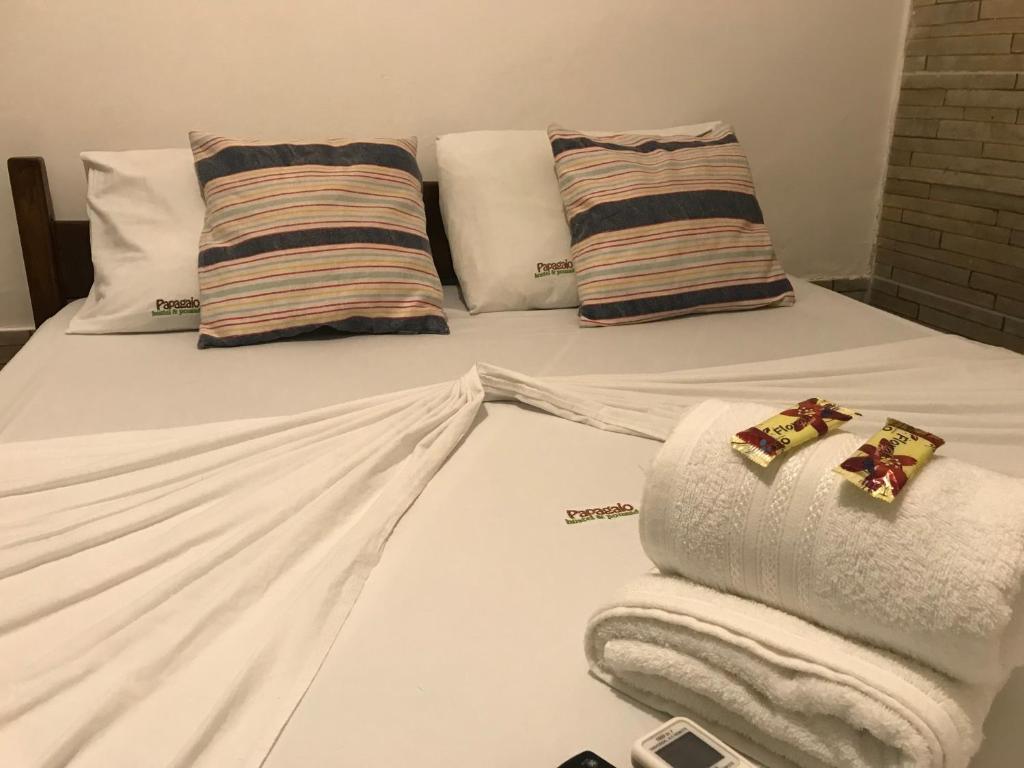 Voodi või voodid majutusasutuse Papagaio Hostel & Pousada toas