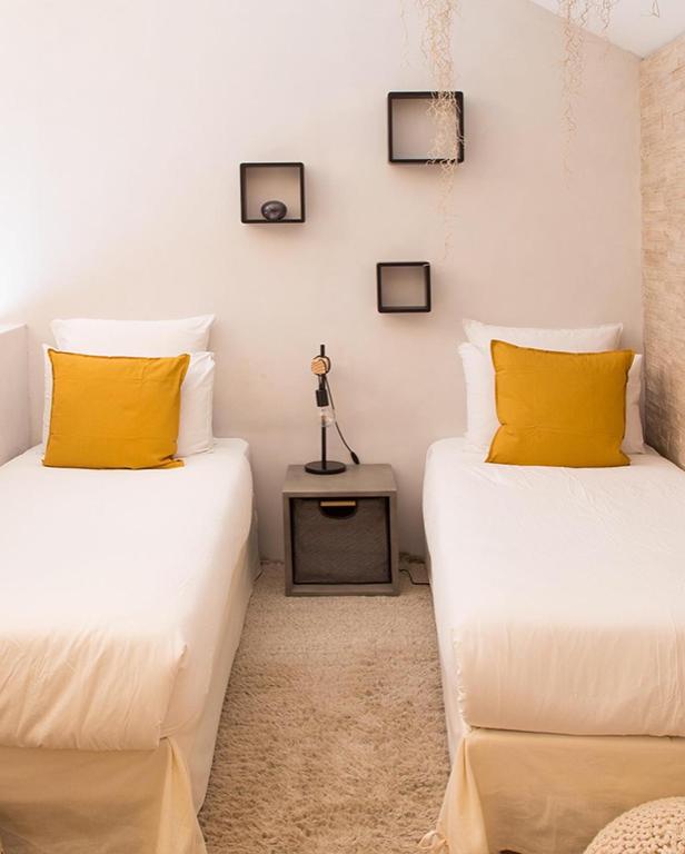 Postel nebo postele na pokoji v ubytování Maison Lapopie chambres et gîte