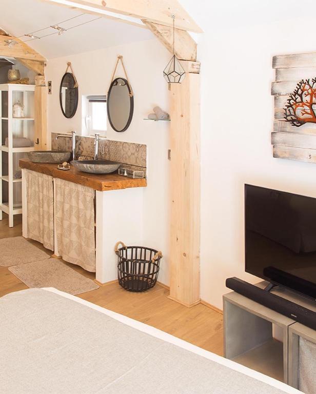 Kuchyň nebo kuchyňský kout v ubytování Maison Lapopie chambres et gîte