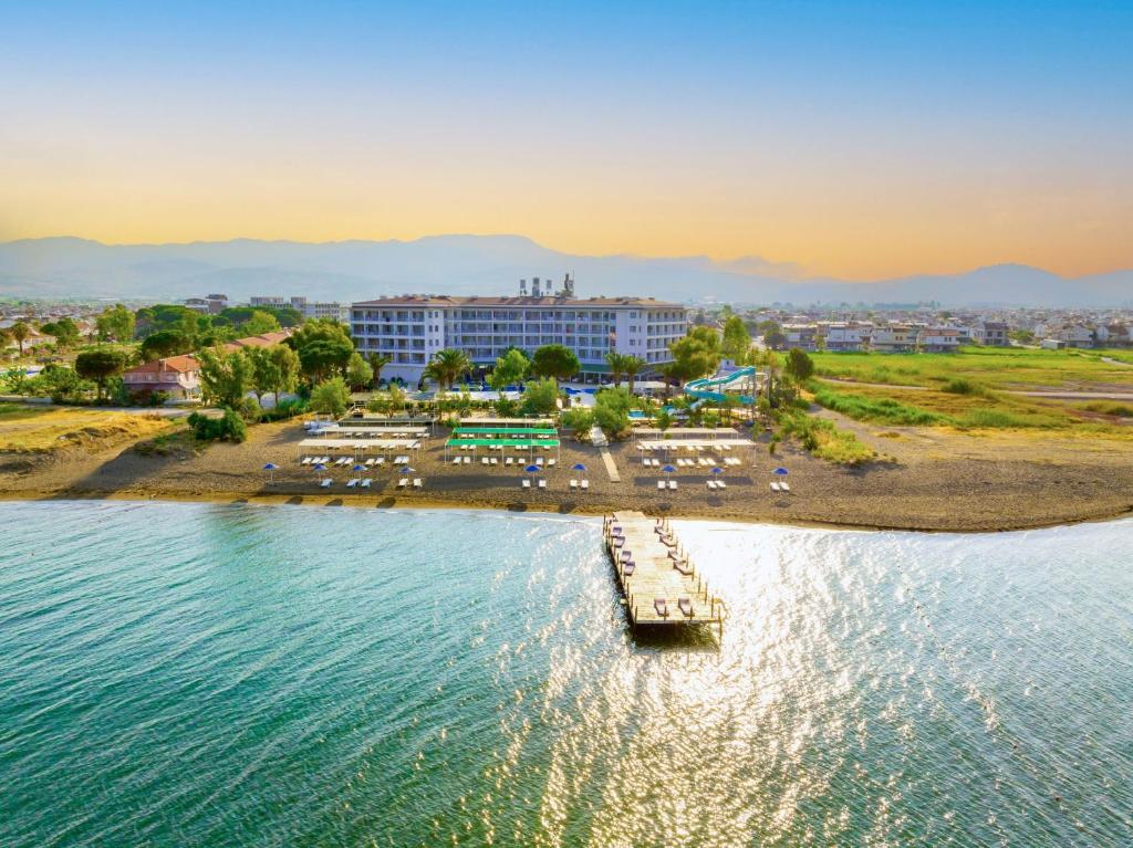 an aerial view of a resort on the water at Le Monde Beach Resort & Spa in Izmir