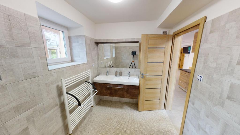 Koupelna v ubytování Apartmány U Mirase
