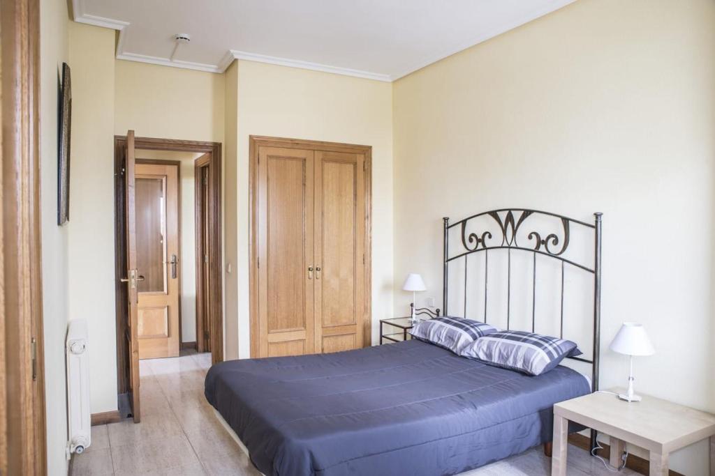 Posteľ alebo postele v izbe v ubytovaní Apartamento Samil Primera Línea de Playa 2H