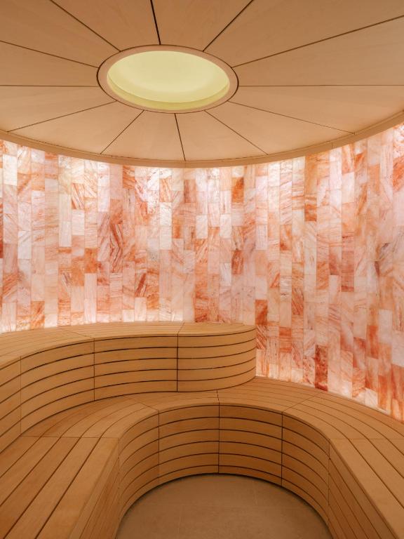 an empty room with a ceiling and a light at Hôtel & Spa Belle Plage in Cannes