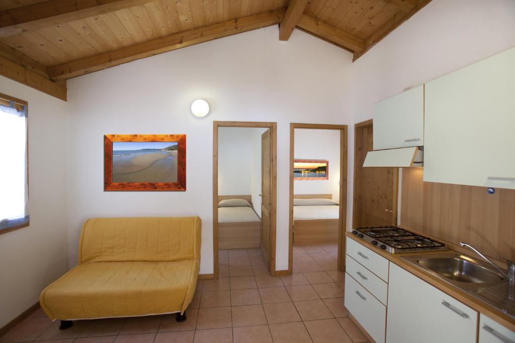 Kuchyň nebo kuchyňský kout v ubytování Camping Village Oasi