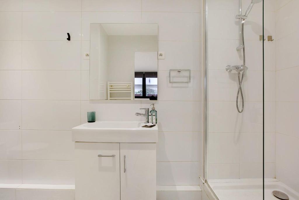 Kúpeľňa v ubytovaní Cosy apartment - 6P-2BR - République