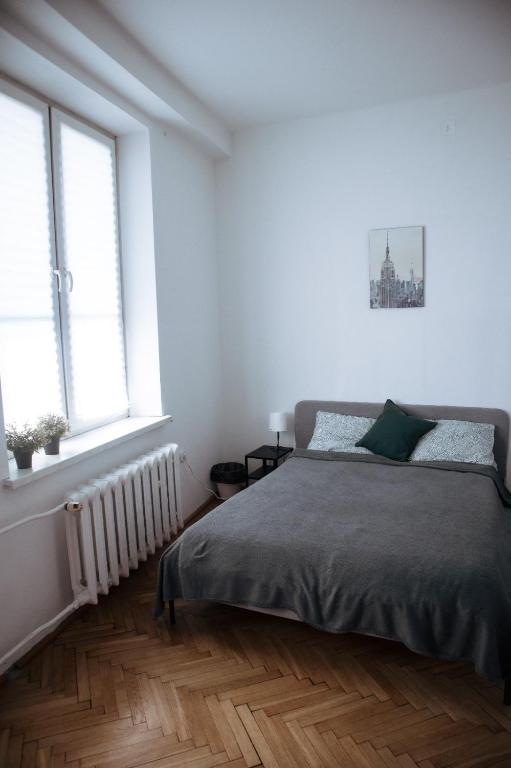 Posteľ alebo postele v izbe v ubytovaní Room in Old Town Krakow
