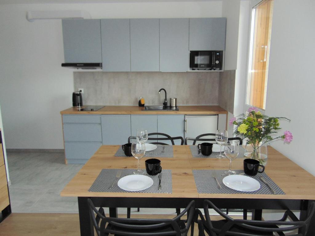 Kuchyňa alebo kuchynka v ubytovaní Apartament Szklarski Zakątek