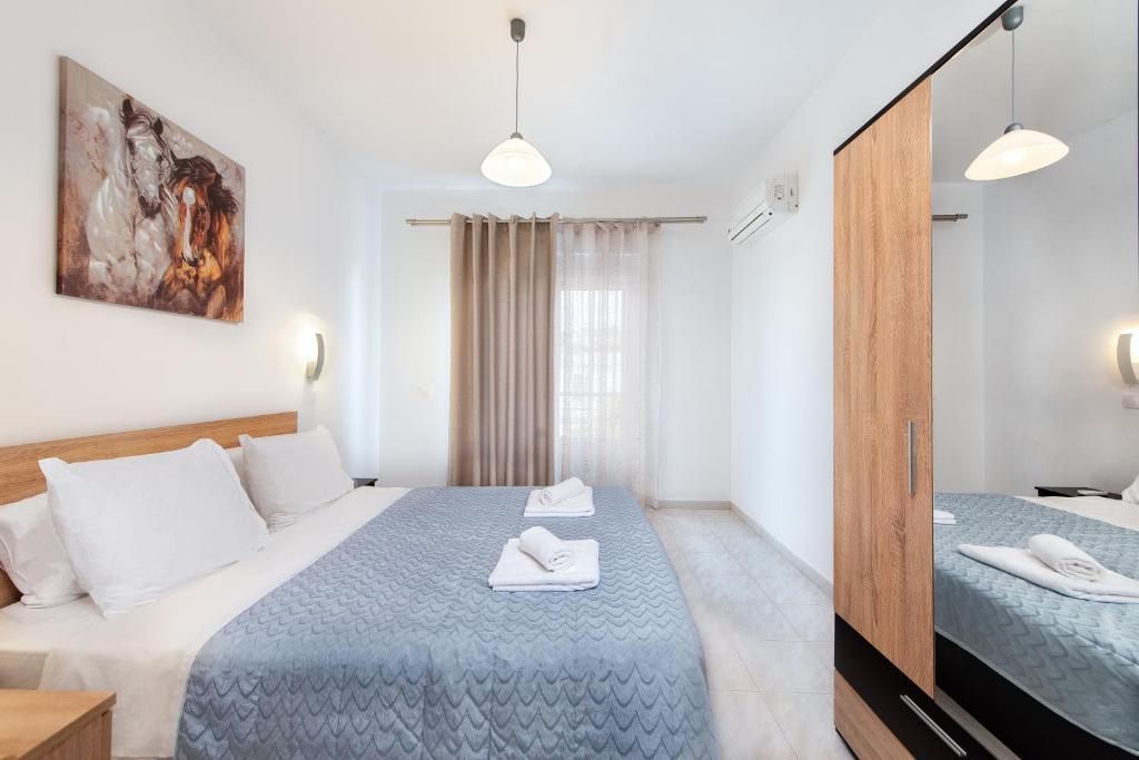A bed or beds in a room at Dolce Casa Suite1