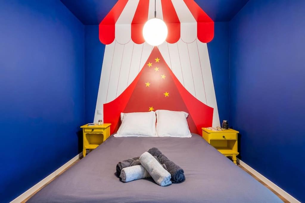 Säng eller sängar i ett rum på Magic Circus, 3 couchages séjour dépaysant