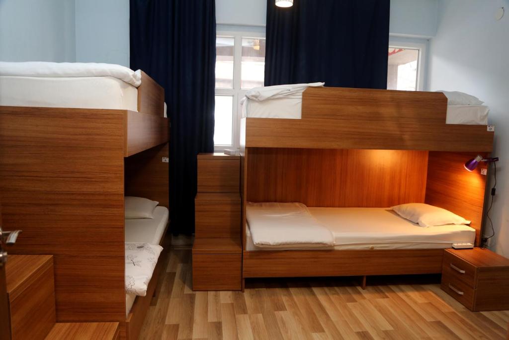 Postel nebo postele na pokoji v ubytování Moon Hostel