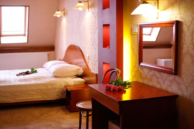 Ένα ή περισσότερα κρεβάτια σε δωμάτιο στο Motel Delfin **