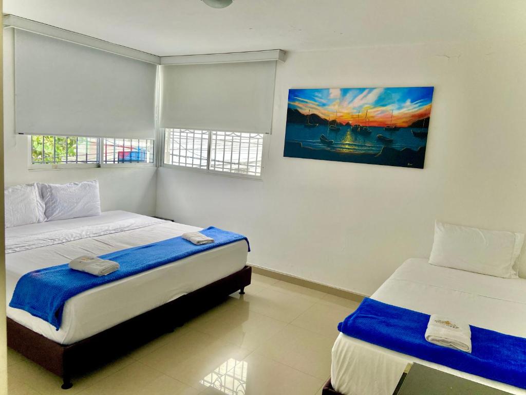 Ένα ή περισσότερα κρεβάτια σε δωμάτιο στο Hotel Parque de los Novios Inn