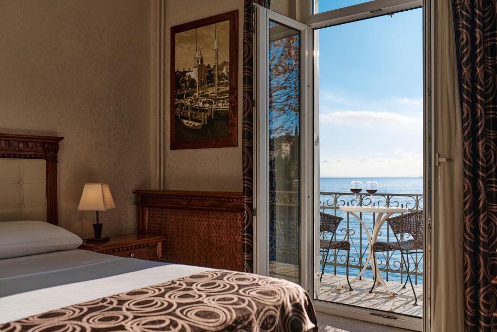 Łóżko lub łóżka w pokoju w obiekcie Hotel Villa Schubert