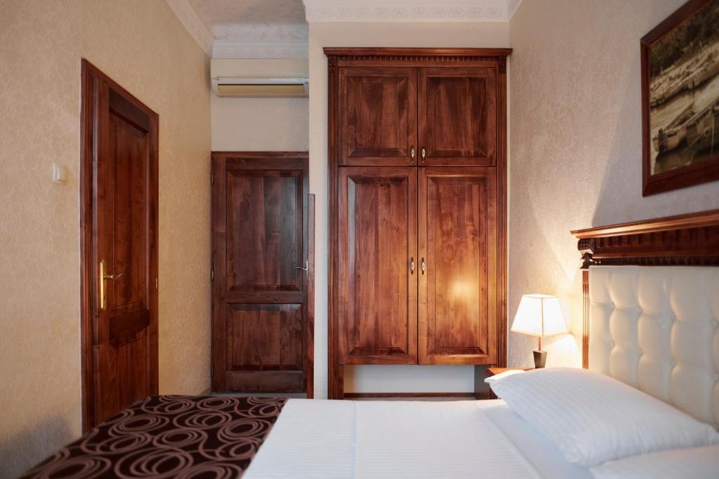 Łóżko lub łóżka w pokoju w obiekcie Hotel Villa Schubert
