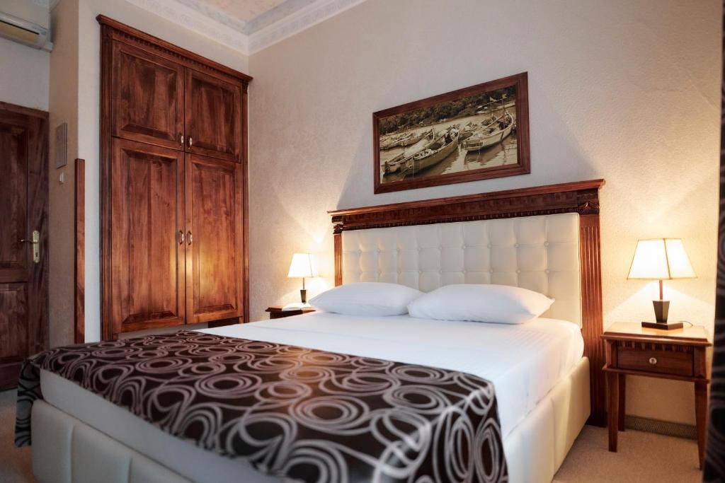 Łóżko lub łóżka w pokoju w obiekcie Hotel Villa Schubert