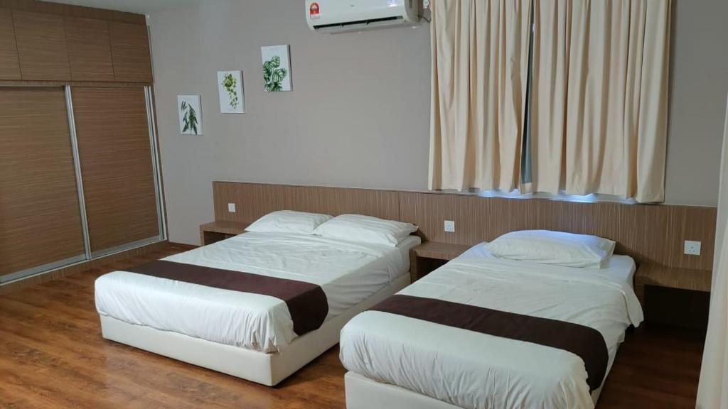 Postel nebo postele na pokoji v ubytování Yew Hotel