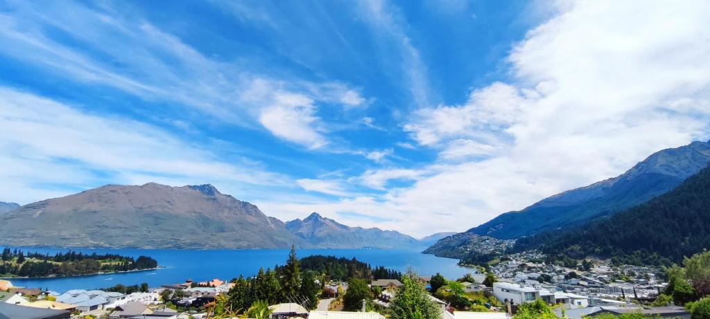 a view of a lake in the mountains at Spacious Home with Awesome Lake Views in Queenstown
