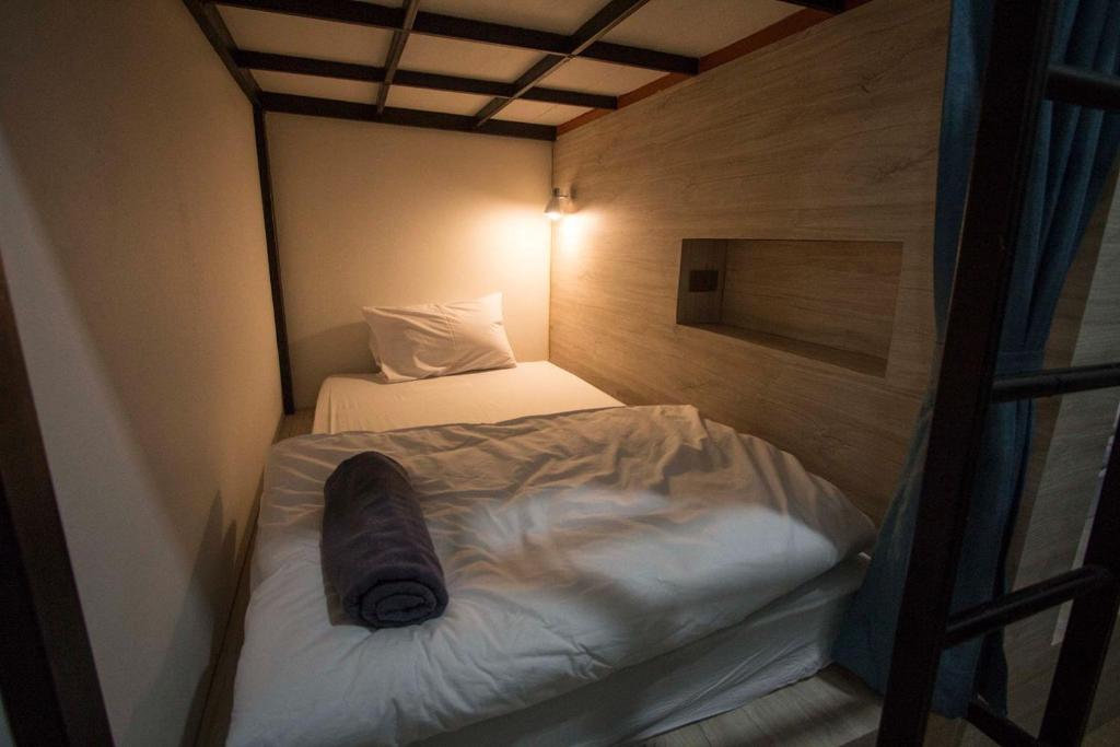 Postel nebo postele na pokoji v ubytování All day hostel at BTS Bang Chak