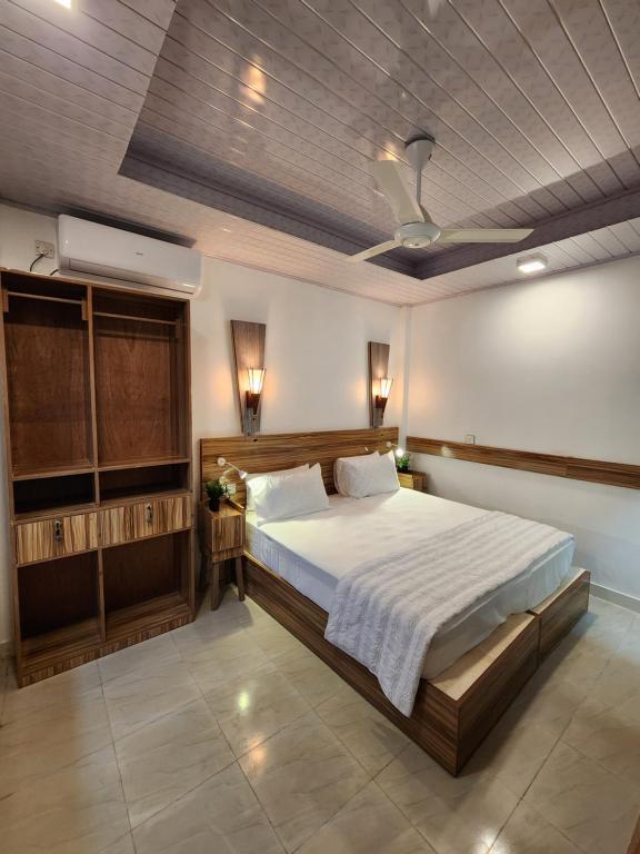Postel nebo postele na pokoji v ubytování Batuta Maldives Fourson