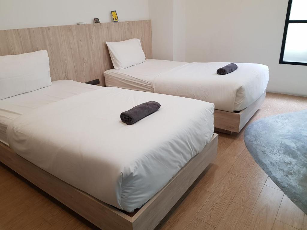 Postel nebo postele na pokoji v ubytování All day hostel at BTS Bang Chak