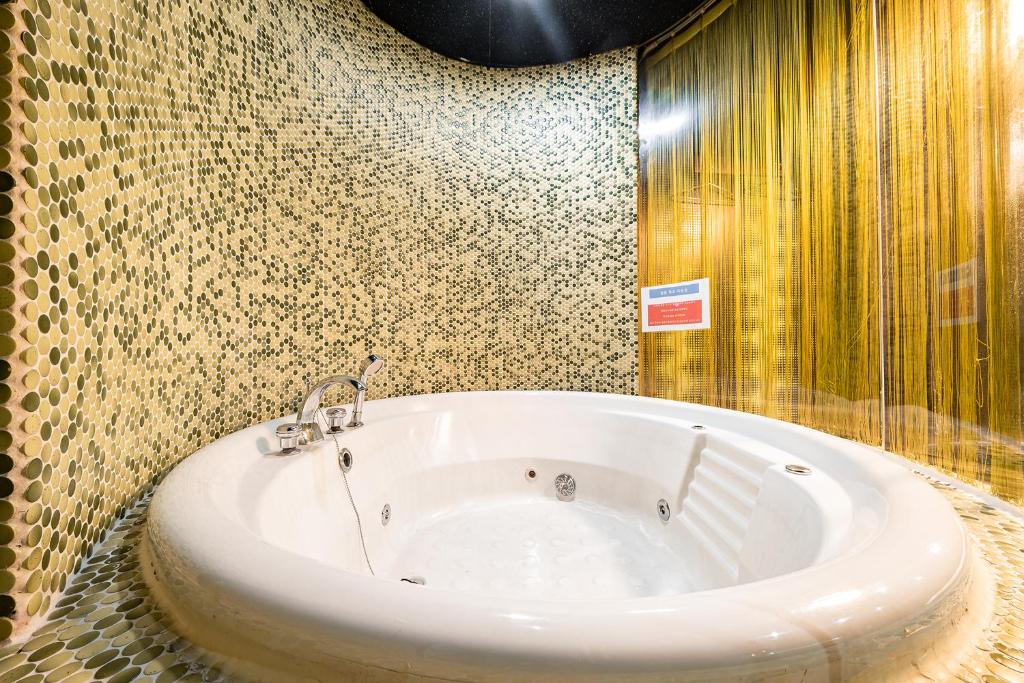 Koupelna v ubytování Laria Hotel