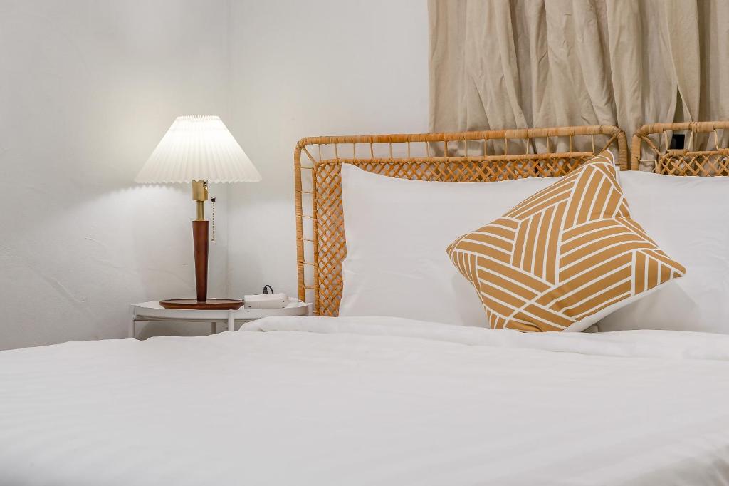 Letto o letti in una camera di Taitung Homeabout Pet Friendly Hall