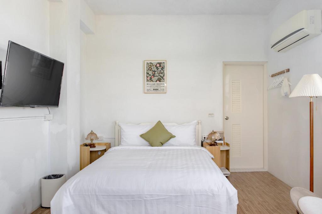 Letto o letti in una camera di Taitung Homeabout Pet Friendly Hall