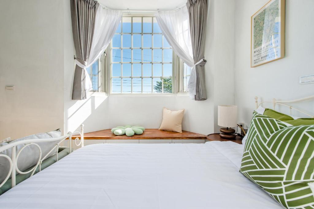Letto o letti in una camera di Taitung Homeabout Pet Friendly Hall