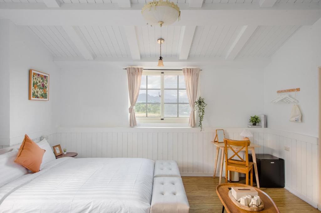 Letto o letti in una camera di Taitung Homeabout Pet Friendly Hall