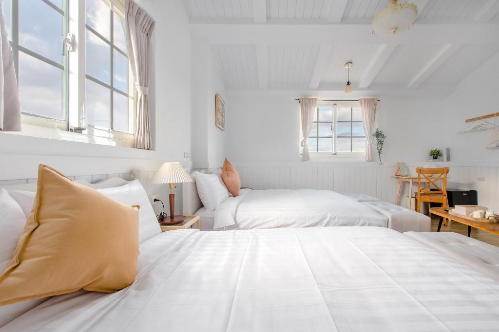 Letto o letti in una camera di Taitung Homeabout Pet Friendly Hall