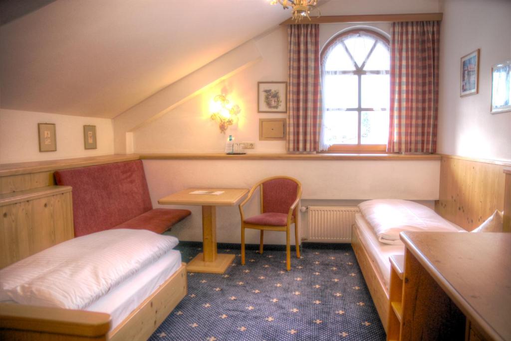Posezení v ubytování Hotel Hölzer Bräu by Lehmann Hotels