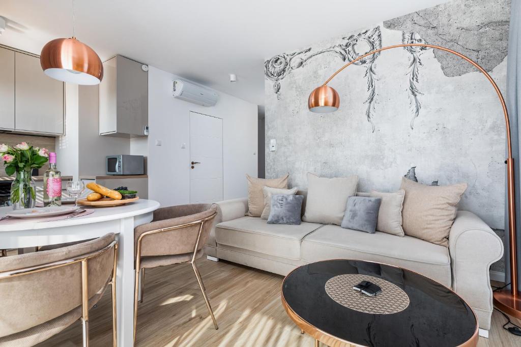 Posedenie v ubytovaní Apartamenty Osiedle Bursztynowe III by Noclegi Renters
