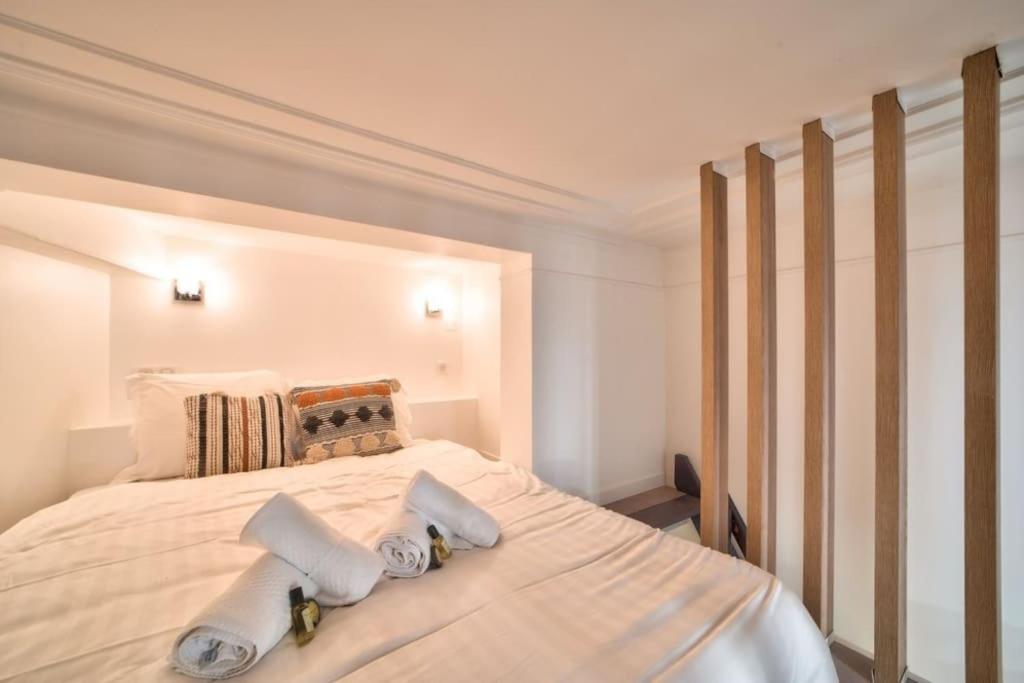 Posteľ alebo postele v izbe v ubytovaní Bel appartement au coeur de Montmartre