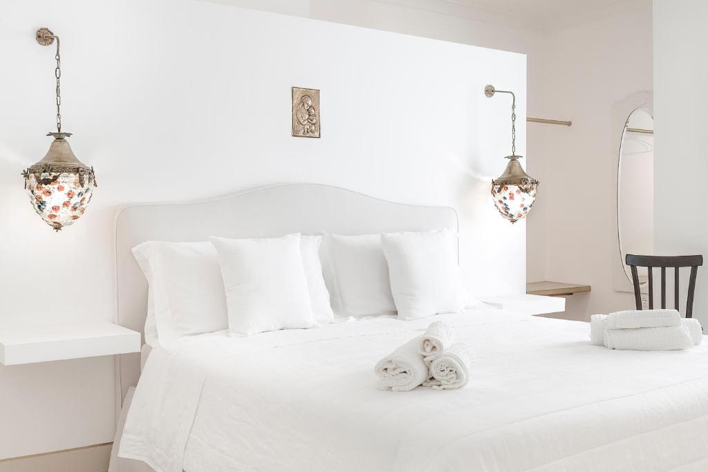 Postel nebo postele na pokoji v ubytování Relais Carlo Alberto