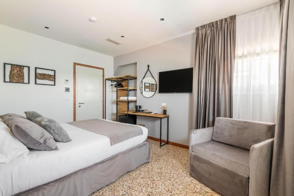 TV a/nebo společenská místnost v ubytování Sea Tower Torre Telemetrica Lido di Venezia