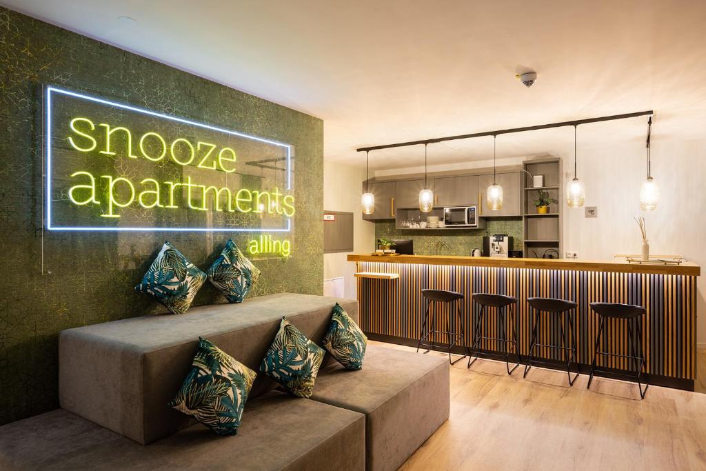 Kuchyň nebo kuchyňský kout v ubytování Snooze Apartments Alling