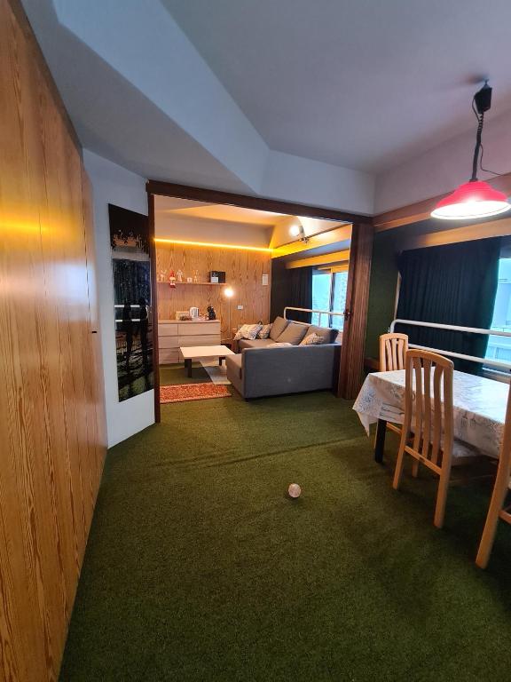 Postel nebo postele na pokoji v ubytování La casa di Ninis a Marilleva 1400