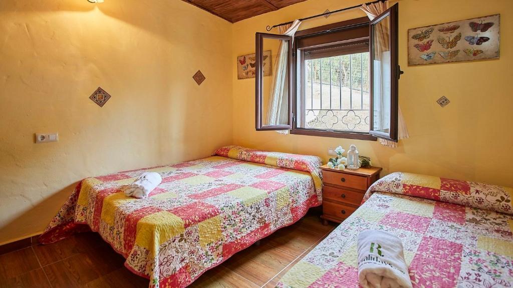 Posteľ alebo postele v izbe v ubytovaní Casa Los Olivos Prado del Rey by Ruralidays