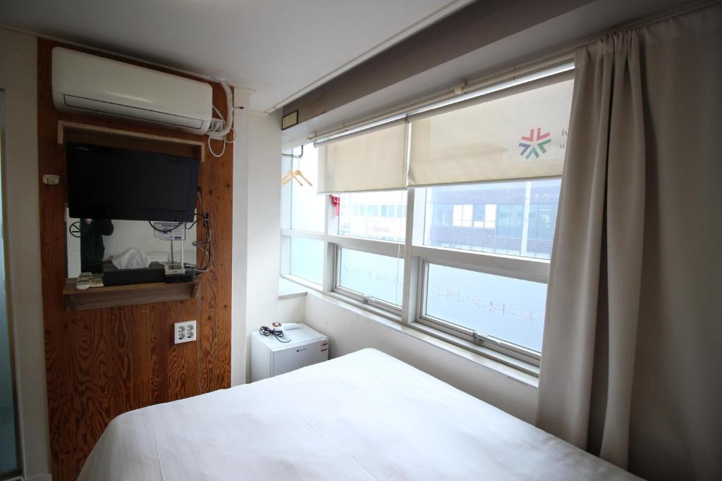 Cama ou camas em um quarto em Hostel Kpop