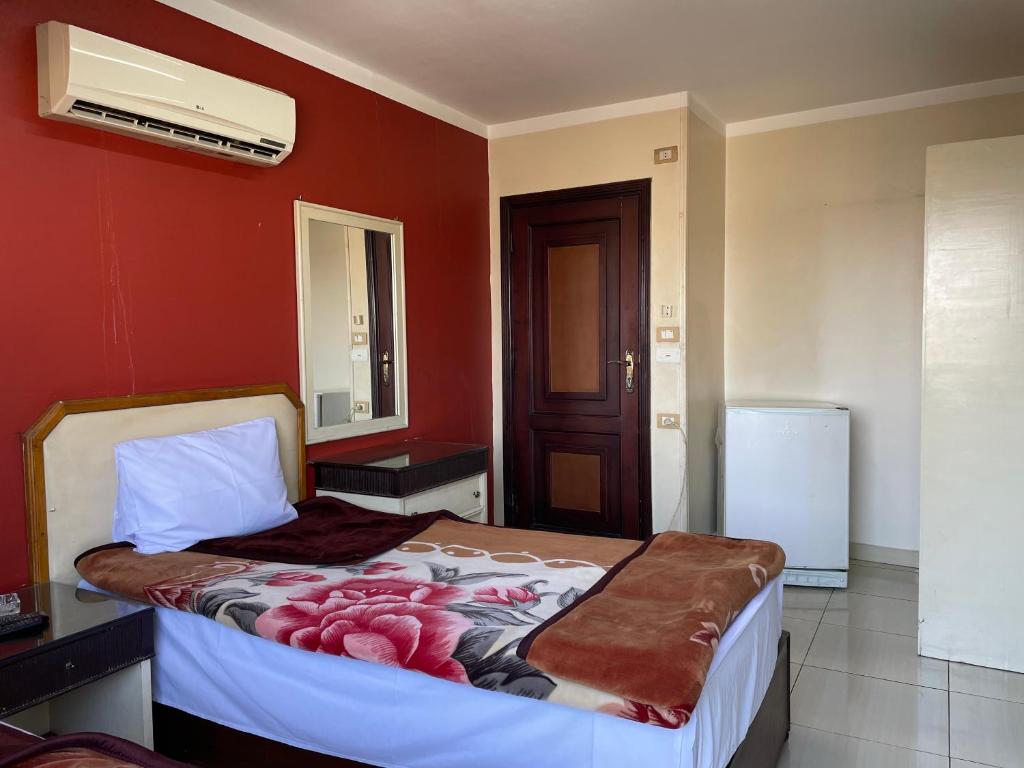 Postel nebo postele na pokoji v ubytování Isis Hostel 2
