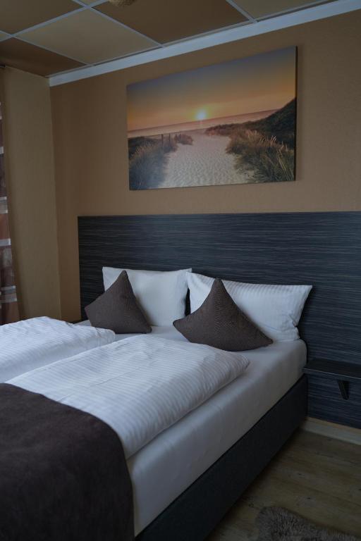 Postelja oz. postelje v sobi nastanitve Hotel Auszeit im Euro Rastpark Guxhagen