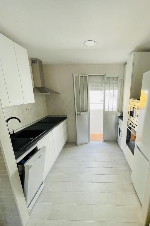 Kuchyň nebo kuchyňský kout v ubytování AITA CASA BARBATE