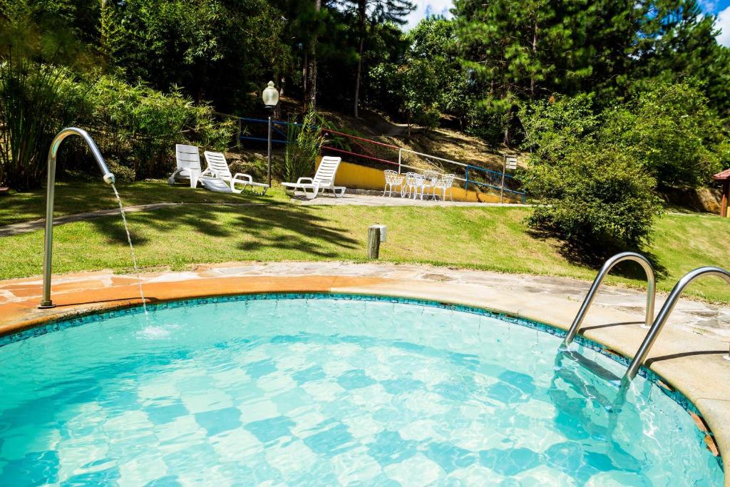 Bazén v ubytování Chez Domaine Pousada Organica nebo v jeho okolí